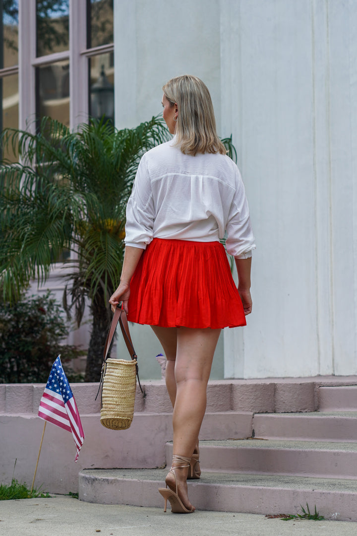 LESLIE PLEATED MINI SKORT- ORANGE RED