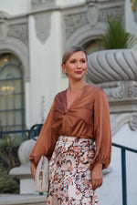 Load image into Gallery viewer, MANUELA SATIN BLOUSE WITH FRONT KNOT- CARAMEL
